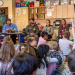 Marco Rivest, Tristan Rivest, and Annie Malo answer the questions from students at Jackson Elementary School